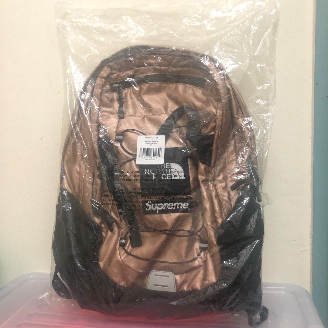 Supreme north face backpack store rose gold