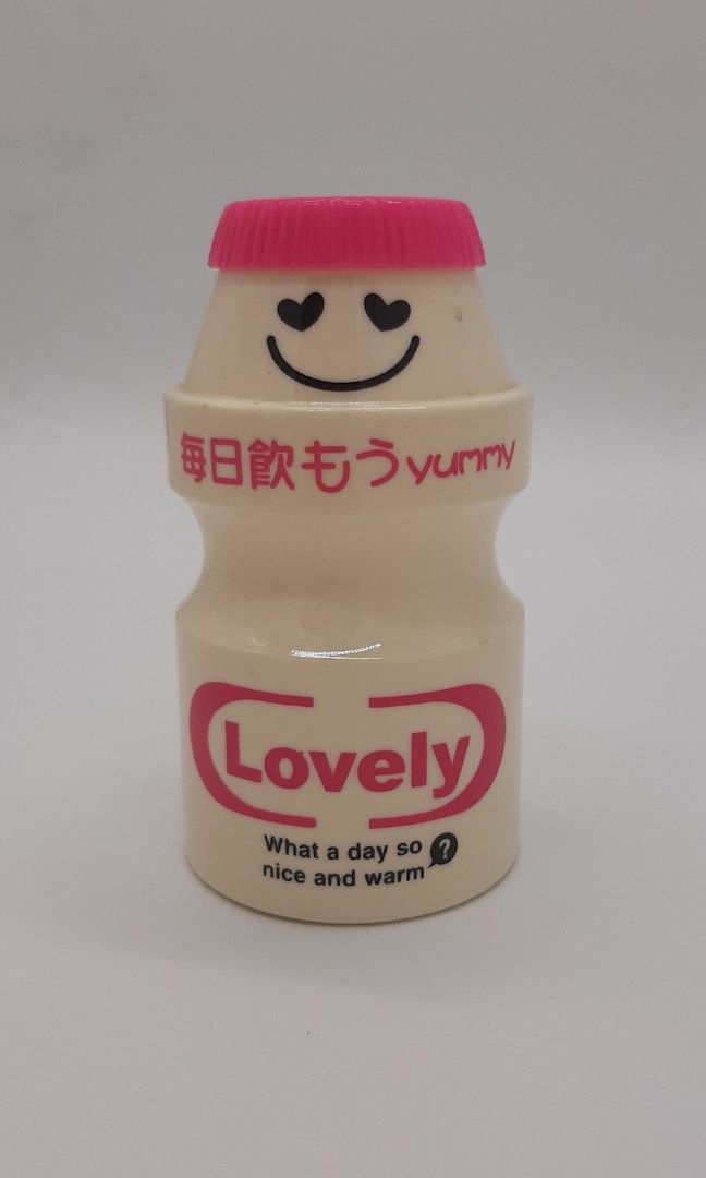 Yakult Coin Bank - pink (Category: Vintage Collectibles) located in Quezon City. Submitted by dmrtea (Listing ID 1209555702, Image 1). Description: - Bottom: 8cm diameter - Bottle Cap & Opening: 4.3cm diameter - Cap opening (where money is inserted): 0.5cm in height 4cm length - Height: 15cm.