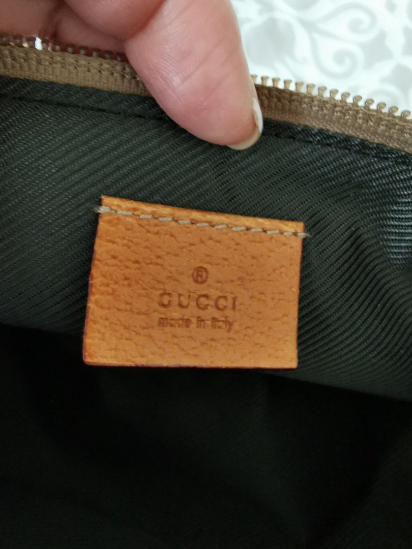 Authentic gucci pouch with arm sling