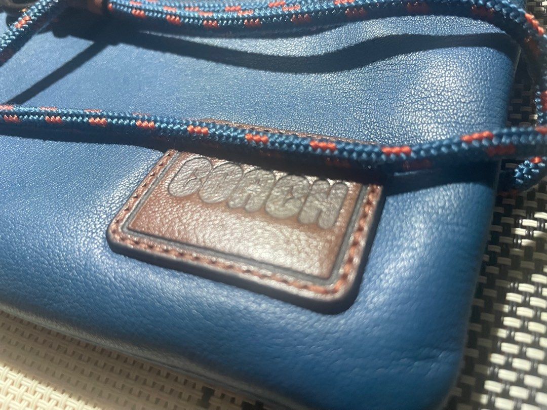 Coach Mini Sling (Category: Wallets & Card Holders) located in Mandaluyong City. Submitted by ipau888 (Listing ID 1209726638, Image 2). Description: Brand: Coach Color: Multi RFS: Not using it anymore Complete Package With Paperbag and dust bag..