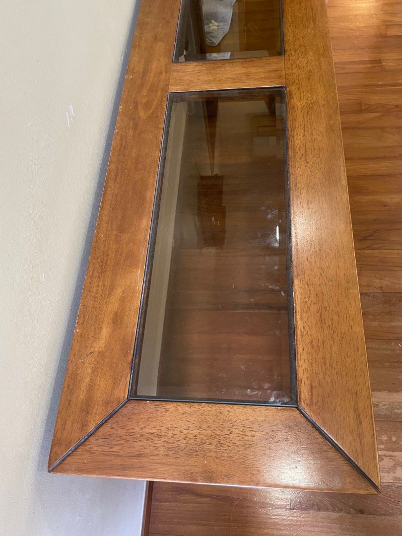 Console table (Category: Tables & Sets) located in Singapore. Submitted by m.poppins (Listing ID 1209695587, Image 2). Description: Side table - glass top / wood frame. Width 137cm, depth 39.5cm, height 67cm. Self pick up at Upper Thomson Road. .