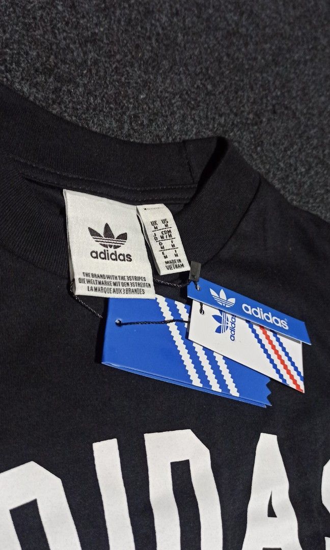 Kaos adidas since 1949 logo vector