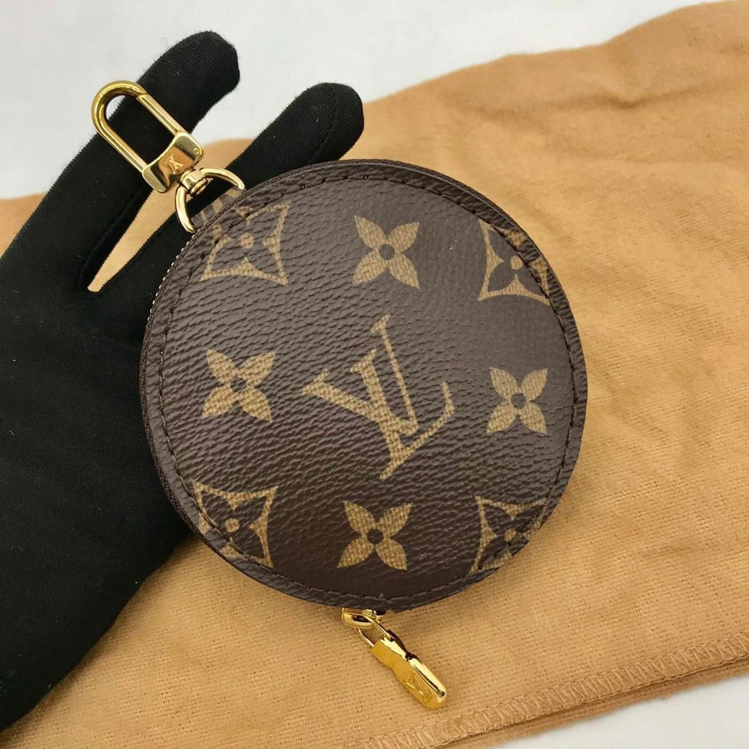 Louis Vuitton circle coin purse, Women's Fashion, Bags & Wallets, Wallets &  Card holders on Carousell