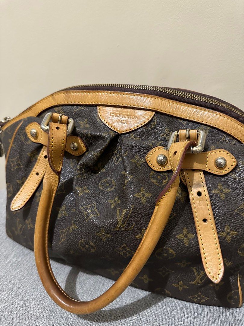 Louis Vuitton Tivoli GM (Category: Luxury Bags & Wallets) located in Paranaque City. Submitted by sofya07 (Listing ID 1209814719, Image 2). Description: - Previously owned and was pre-handed to me - Original with code - Interior is in good condition - No rip, no tear and no holes - Signs of usage - No more inclusions.