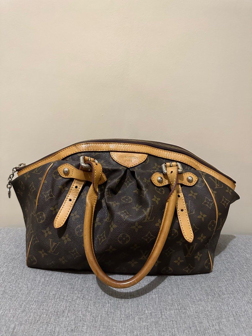 Louis Vuitton Tivoli GM (Category: Luxury Bags & Wallets) located in Paranaque City. Submitted by sofya07 (Listing ID 1209814719, Image 1). Description: - Previously owned and was pre-handed to me - Original with code - Interior is in good condition - No rip, no tear and no holes - Signs of usage - No more inclusions.
