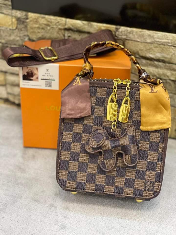 Sold at Auction: Louis Vuitton, LOUIS VUITTON Twilly ALL IN LV