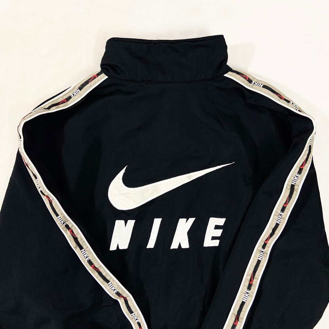 Nike swoosh taped track jacket 2025