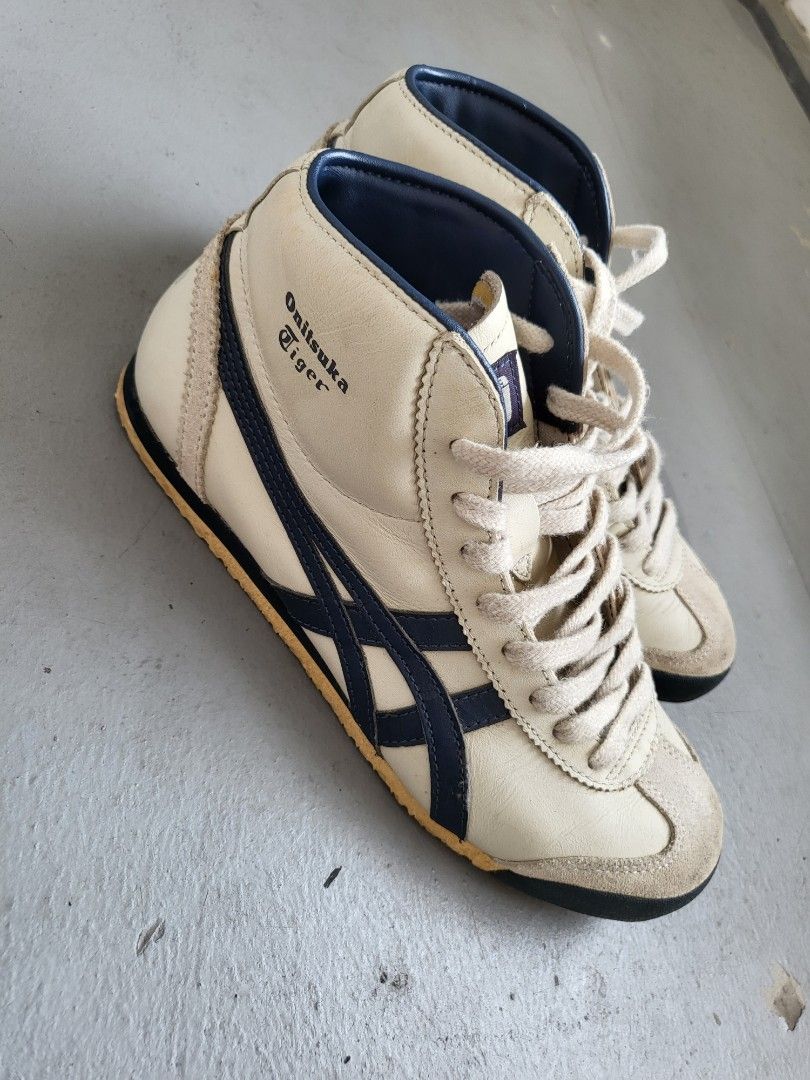 Onitsuka Tiger Unisex Mexico Mid-Runner (Category: Sneakers & Footwear) located in Singapore. Submitted by sshushh (Listing ID 1209799094, Image 2). Description: Size 24cm/ EU38/ US5.5 Unisex high cut Slight worn marks at the back of the shoes, as seen in photo. Retail USD130.