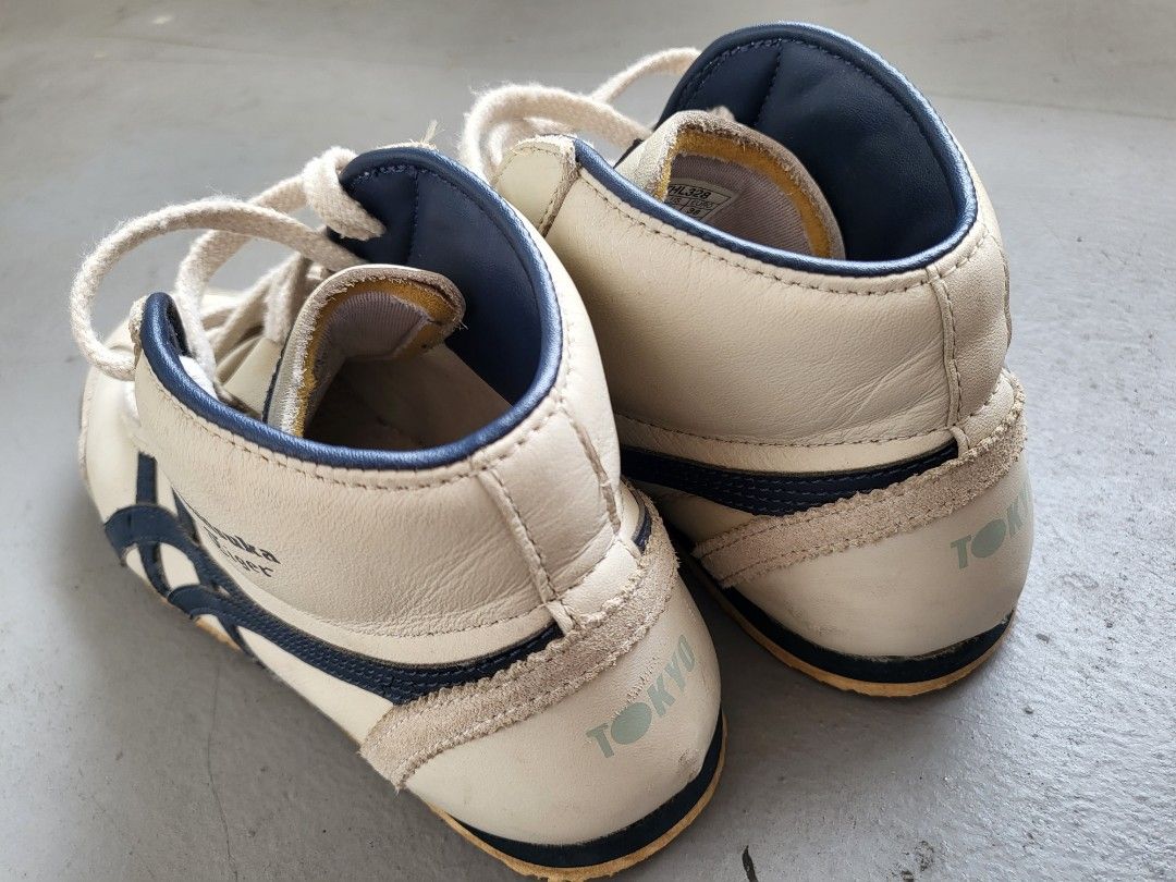 Onitsuka Tiger Unisex Mexico Mid-Runner (Category: Sneakers & Footwear) located in Singapore. Submitted by sshushh (Listing ID 1209799094, Image 3). Description: Size 24cm/ EU38/ US5.5 Unisex high cut Slight worn marks at the back of the shoes, as seen in photo. Retail USD130.