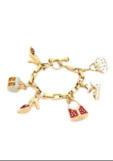 Over the top solid gold Rosato charm bracelet