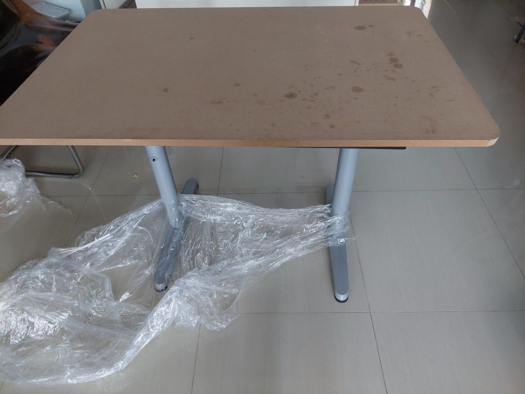 Study Table (Category: Tables & Sets) located in Singapore. Submitted by oddsloth (Listing ID 1209796140, Image 1). Description: Lightly used table. Legs are in good condition. table top has light oil stain. 32" x 47.5". Ht is 29". .