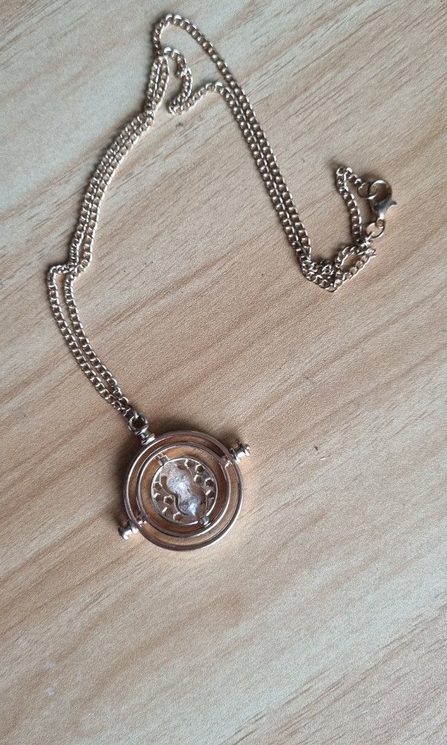 Time turner necklace (from Harry Potter) (Category: Necklaces) located in Quezon City. Submitted by averyav (Listing ID 1209768289, Image 1). Description: Time turner necklace as featured in Harry Potter ⚡️ Used once only, good as new! No flaws RFS: barely used.