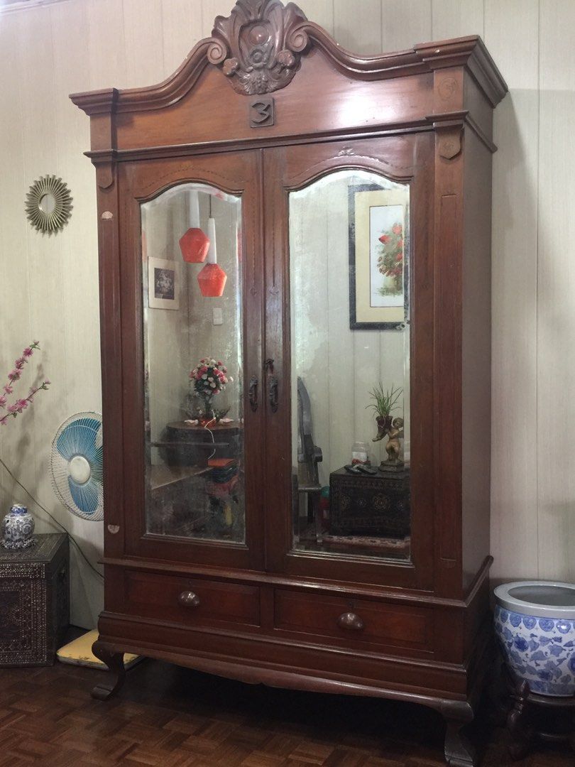 VINTAGE/ANTIQUE NARRA CABINET (Category: Shelves, Cabinets & Racks) located in Imus. Submitted by mystufftoyours (Listing ID 1209781200, Image 1). Description: Vintage/Antique Narra cabinet with front mirror, 2 drawer below the mirror door, 1 drawer inside with shelves HEIGHT 7F 9 WIDTH 4F 2 THICKNESS 1F 8 Approximately 20 kilos in weight Payment can be bank transfer or COD Price are still Negotiable, pwede naman pag usapan, madami nman po kaming