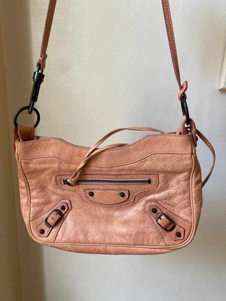 AUTHENTIC Balenciaga Coral Hip Bag (Category: Luxury Bags & Wallets) located in Quezon City. Submitted by closetofcoco (Listing ID 1209943066, Image 1). Description: GUARANTEED AUTHENTIC PM FOR INQUIRIES NO LOW BALLING.
