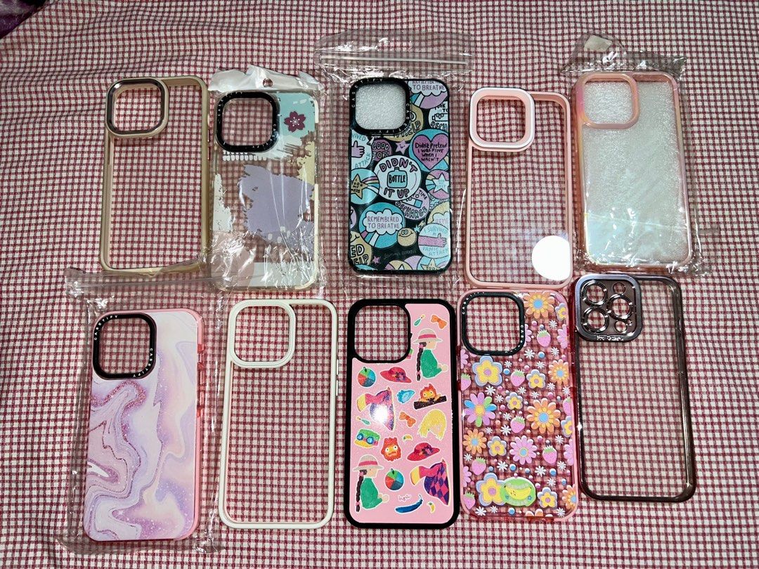 iPhone 13 pro cases (read description) (Category: Cases & Sleeves) located in Taguig. Submitted by tee.clutter (Listing ID 1209985168, Image 1). Description: All are 59 pesos except the howl's moving castle. Howl case - sold! flower case - sold! not original casetify yung mga may tatak hehe message me if you have questions :).