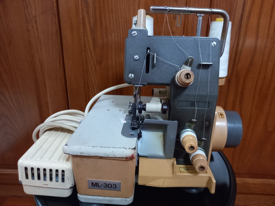 Mammylock ML303 3 thread overkock machine/ sewing machine .锁