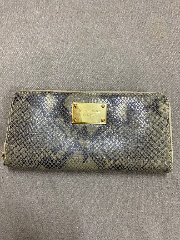 Michael kors long wallet gold colour, Luxury, Bags & Wallets on Carousell