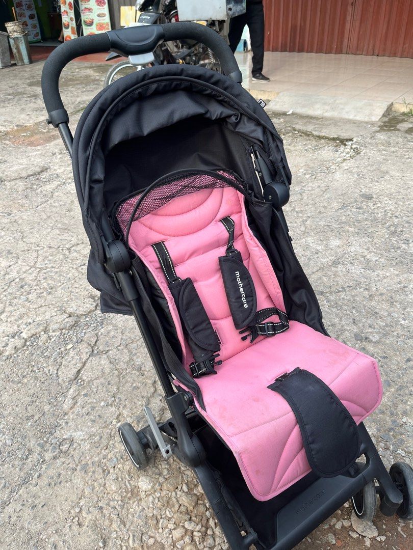 Mothercare ride online stroller pink