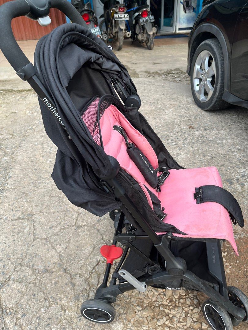 Mothercare ride stroller hot sale pink