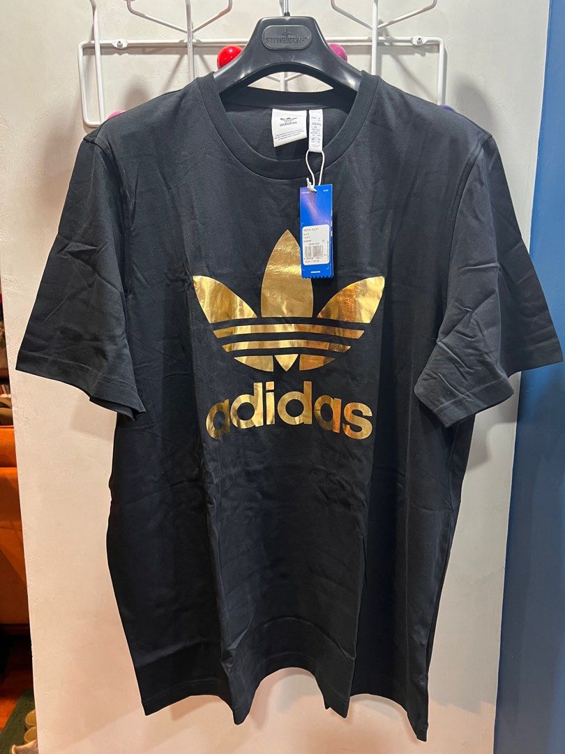 Black and clearance gold adidas shirt