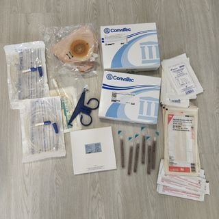 Assorted Urostomy items - Bag, pouch, strip paste,