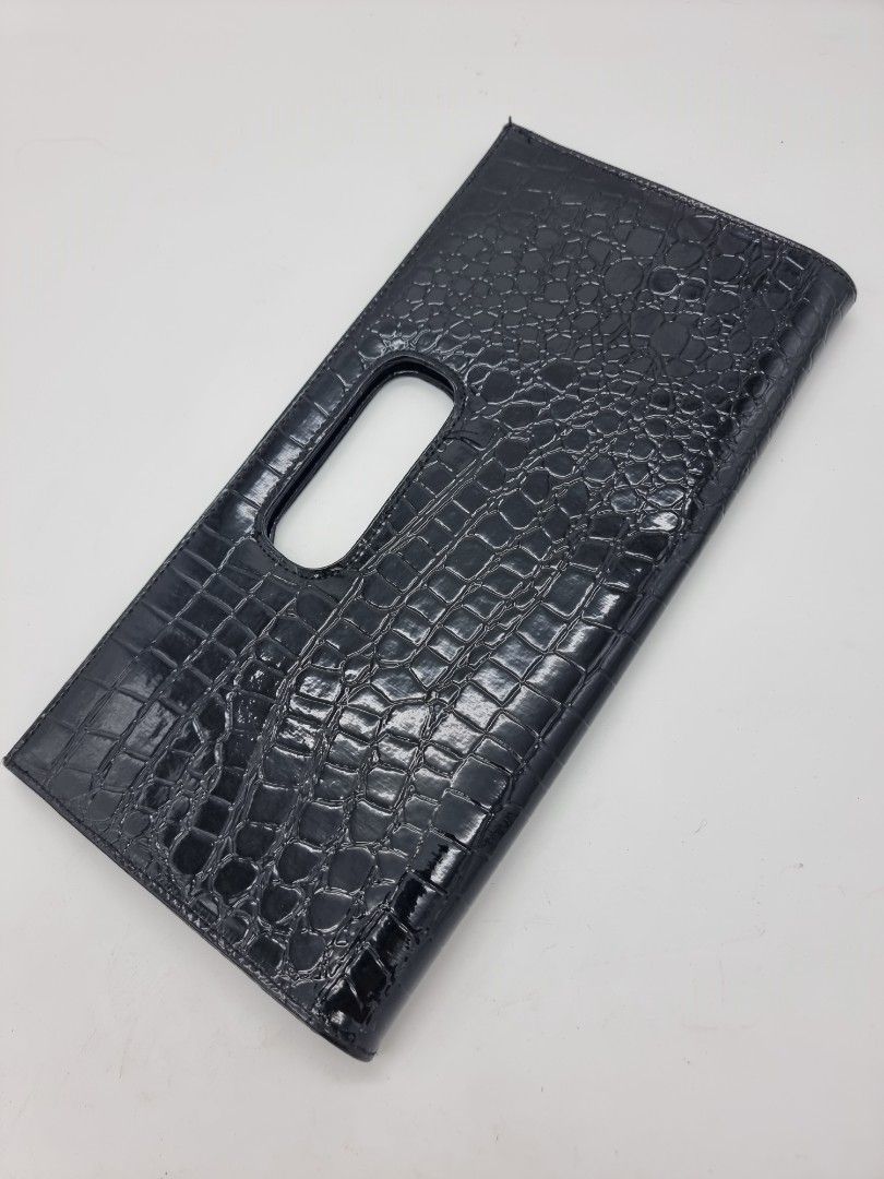 Black Classy Clutch with Magnetic Enclosure (Category: Clutches) located in Quezon City. Submitted by dmrtea (Listing ID 1210155923, Image 1). Description: Height 16.5cm Length 33cm Width 3cm.