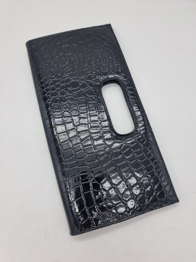 Black Classy Clutch with Magnetic Enclosure (Category: Clutches) located in Quezon City. Submitted by dmrtea (Listing ID 1210155923, Image 2). Description: Height 16.5cm Length 33cm Width 3cm.