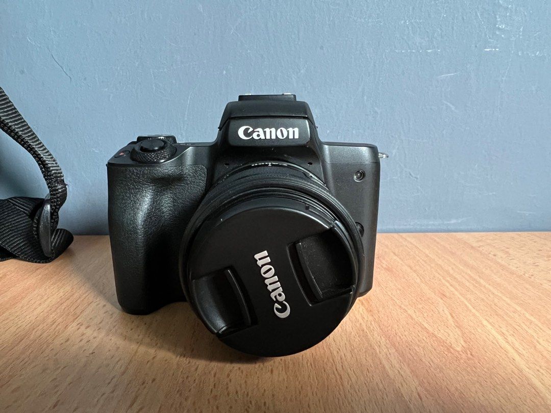 CANON M50 + 1545mm STM kit lens 99. Shutter count 10k only., Photography, Cameras on Carousell