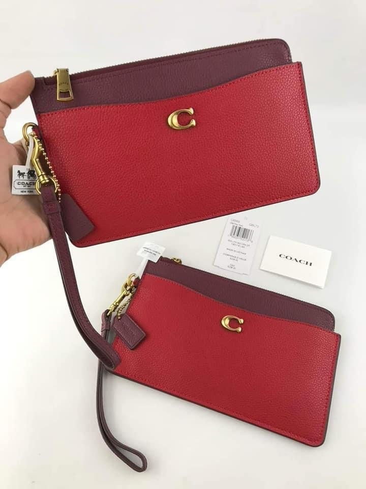 CCH ZIP WRISTLET (Category: Luxury Bags & Wallets) located in Batangas. Submitted by Aki.s_Cart (Listing ID 1210170556, Image 2). Description: CCH L Zip Wristlet 20cm (L) x 12cm (H) P1,500 + sf Actual photo Mirror Copy.