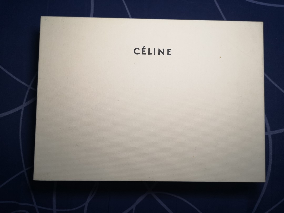 Celine zipped leather waller, Luxury, Bags & Wallets on Carousell