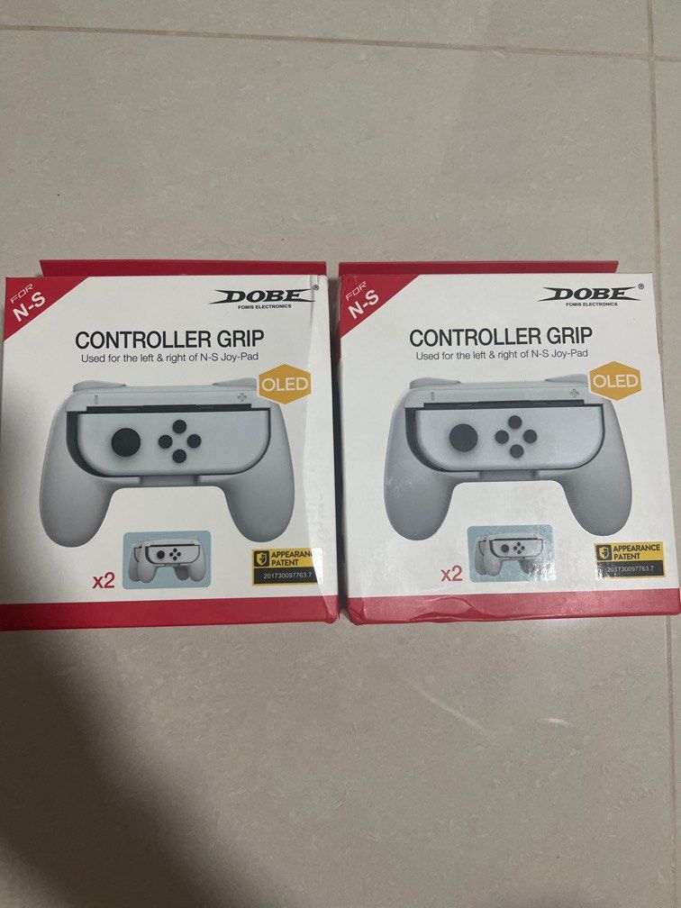 Controller Grip for Switch (Category: Controllers) located in Singapore. Submitted by fong.hanling (Listing ID 1210167482, Image 1). Description: Selling brandnew controller grip for switch. $7.40 each box Colour: white.
