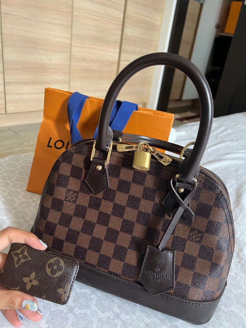 Louis Vuitton Alma Bag (Category: Luxury Bags & Wallets) located in Paranaque City. Submitted by vanillameow (Listing ID 1210104818, Image 1). Description: Free LV money holder.