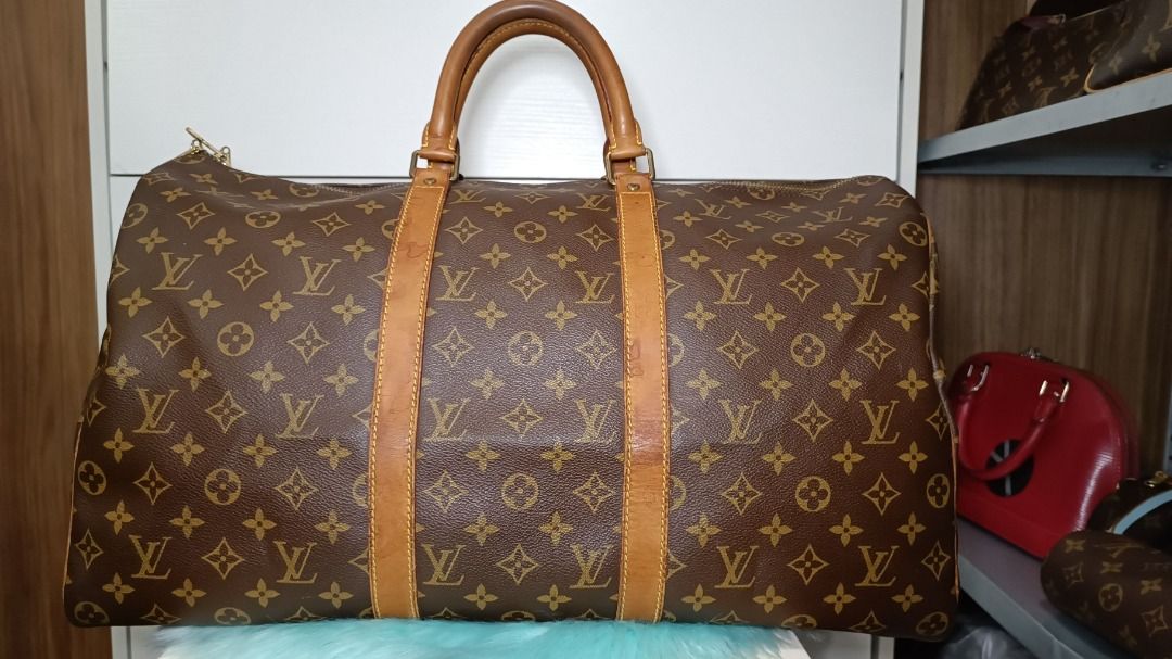 louis vuitton keepall 50 (Category: Luxury Bags & Wallets) located in Las Pinas. Submitted by jvega08 (Listing ID 1210157001, Image 1). Description: selling lv keepall 50 in good condition. some cracks and water stain on vachetta leather but no cracks/damge on vinyl.. bag only...