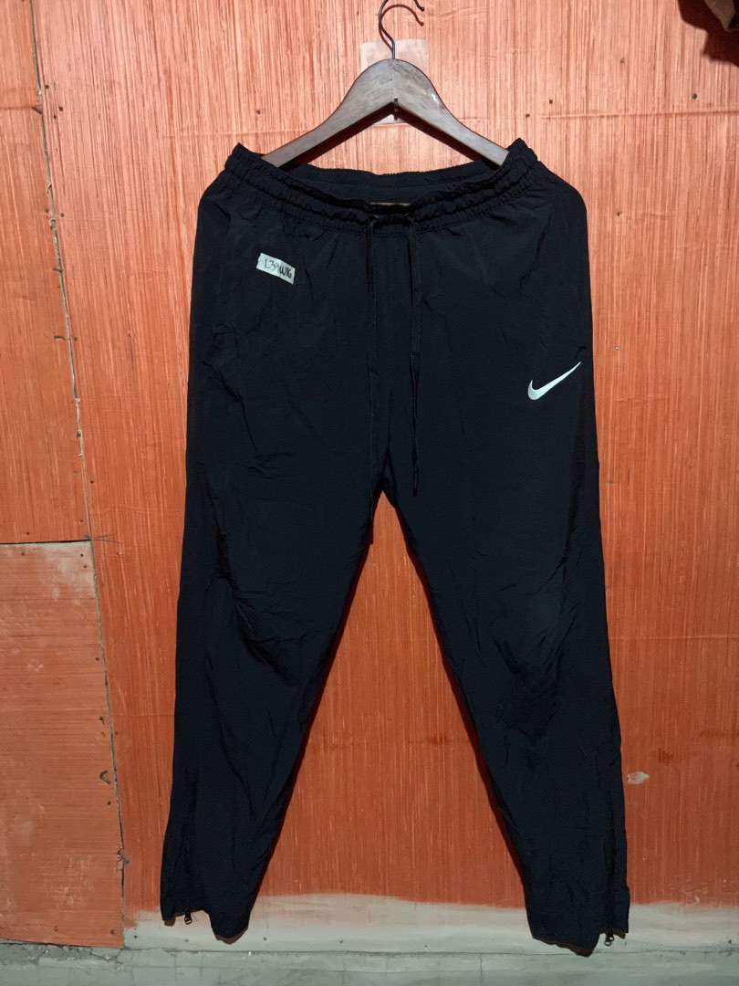Nike silk jogger pants Men s Fashion Bottoms Joggers on Carousell