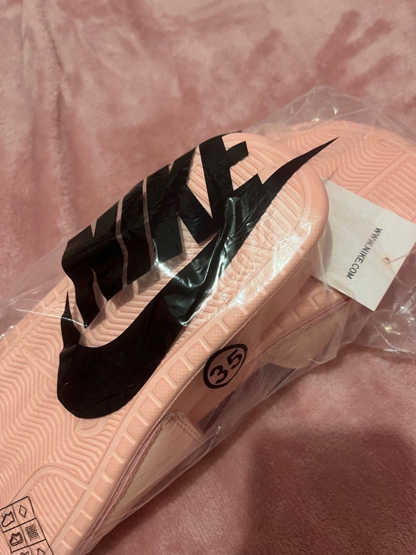blush pink nike slides