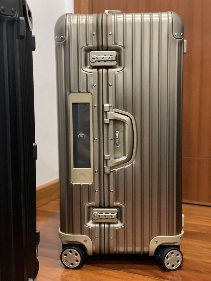 Rimowa topas titanium sport new arrivals