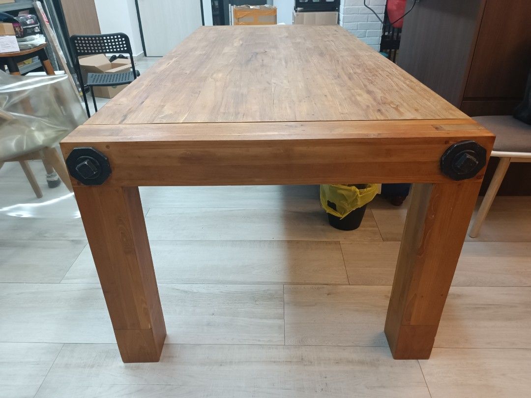 Solid Wood Dining Table (Category: Tables & Sets) located in Singapore. Submitted by adrian.wan1 (Listing ID 1210199397, Image 3). Description: Solid Wood dinning table Great condition, with protective cover since day 1 Brought $2,600 Length x width x height 225cm x 100cm x 30cm Buyer arrange own transport..