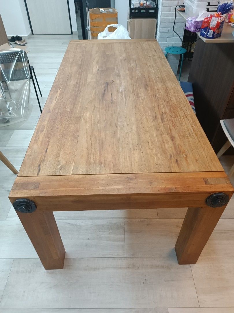 Solid Wood Dining Table (Category: Tables & Sets) located in Singapore. Submitted by adrian.wan1 (Listing ID 1210199397, Image 2). Description: Solid Wood dinning table Great condition, with protective cover since day 1 Brought $2,600 Length x width x height 225cm x 100cm x 30cm Buyer arrange own transport..