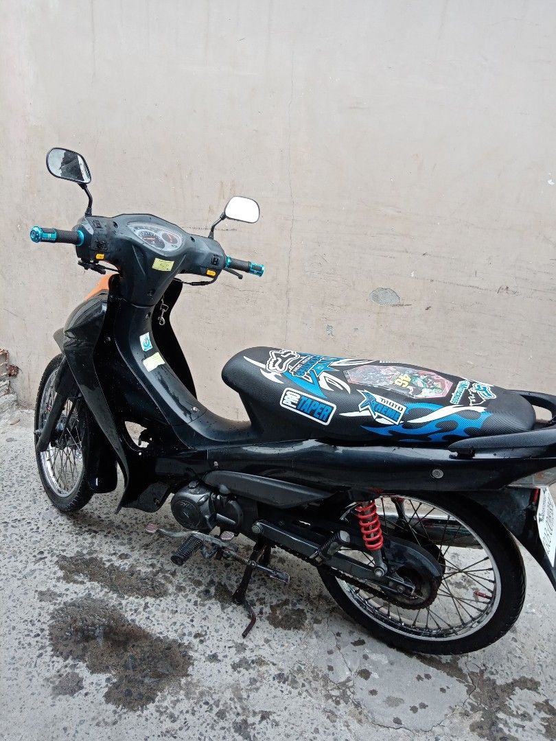 sym bunos 110 (Category: Motorbikes for Sale) located in Las Pinas. Submitted by surenpaul01 (Listing ID 1210192218, Image 2). Description: im selling my sym bonus 110 2017 aqred 2018 model newly tune up change oil strong stock engine low mileage 24800k only new battery push kick start ok all gauges working new seat cover new tire newly register 2025 until 2026 new LTO plate complete orig or cr good condition cont no 09204369541.