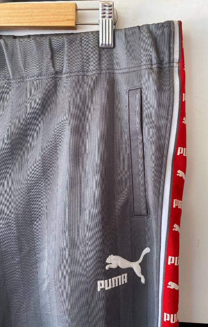 Puma taped side stripe track pants hot sale