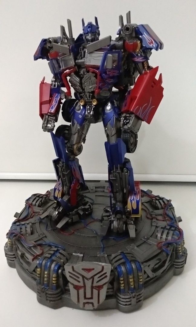 Clearance...dlx decepticon and autobot transformer display base ( optimus prime, megatron