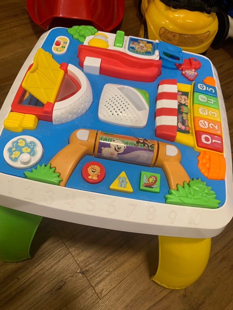 Fisher price laugh and learn around the town activity table online