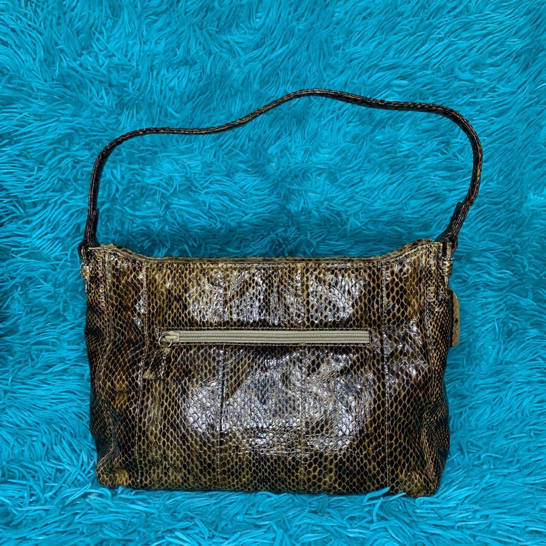 Genuine Snake Skin Leather Shoulder Bag (Category: Shoulder Bags) located in Meycauayan. Submitted by SaveOnBrand (Listing ID 1210348300, Image 3). Description: Length 13” Height 8” Width 4” Preloved Vintage Condition: 8/10 No issues .