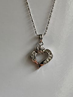 18k Heart shape with diamonds pendant.