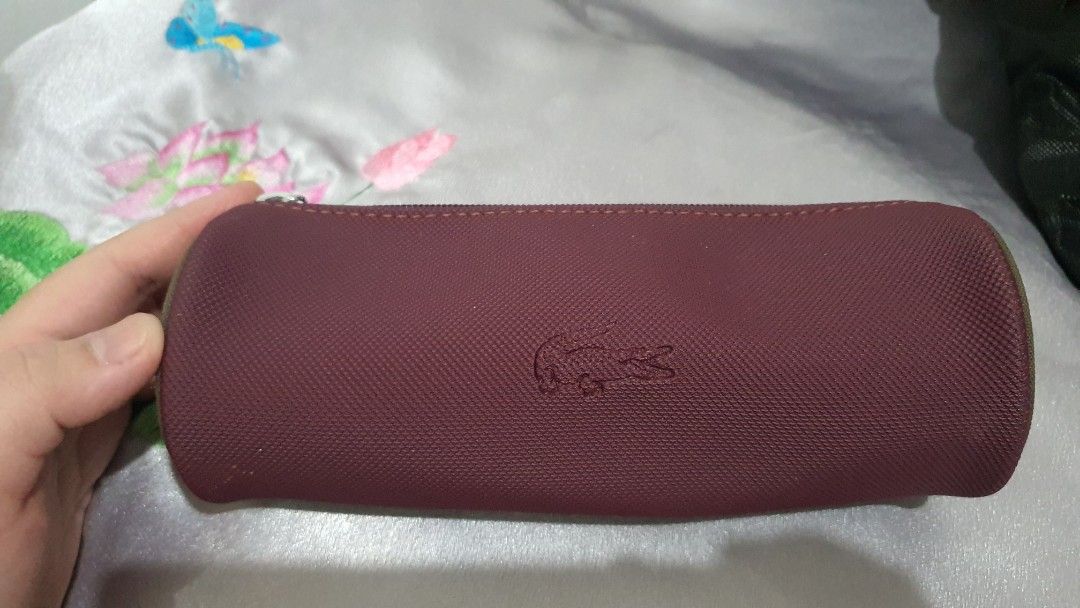 Lacoste Small Pouch (Cylinder) (Category: Luxury Bags & Wallets) located in Manila. Submitted by joyceannelynne (Listing ID 1210386502, Image 1). Description: .
