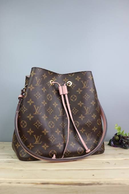 Featuring gorgeous monogram canvas and rose poudre trim, this Louis Vuitton  NeoNoe Monogram is the ideal everyday bag for carrying around…