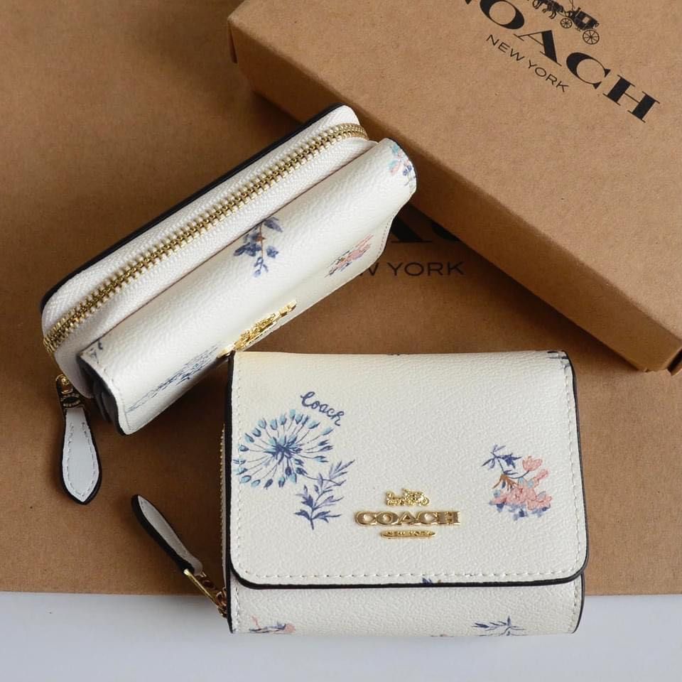Coach dandelion hot sale wristlet