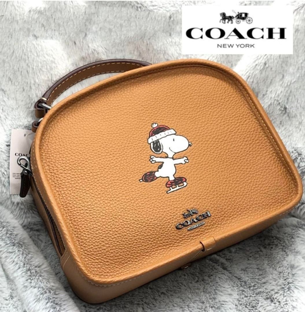 Limited edition snoopy coach hotsell purse
