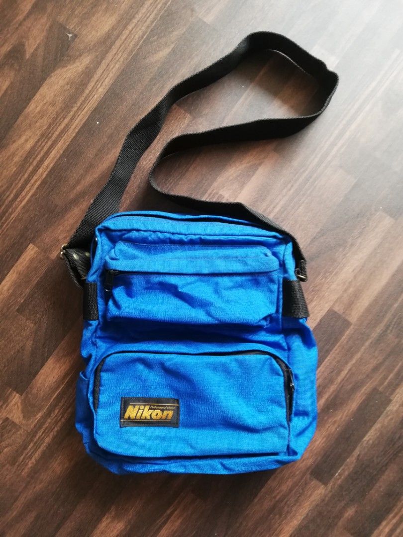 Nikon Blue Sling bag (Category: Sling Bags) located in Bulacan. Submitted by starterpackoo (Listing ID 1210280460, Image 1). Description: -Nikon brand -Blue in color -Large compartment -With front pockets -Adjustable thick strap -Zipper closure -In very good condition 799 ONLY No Meet ups. Delivery via J&T or LBC..