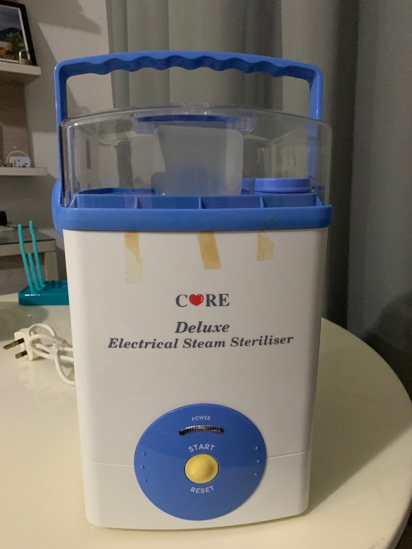 Core deluxe hotsell electric steam steriliser